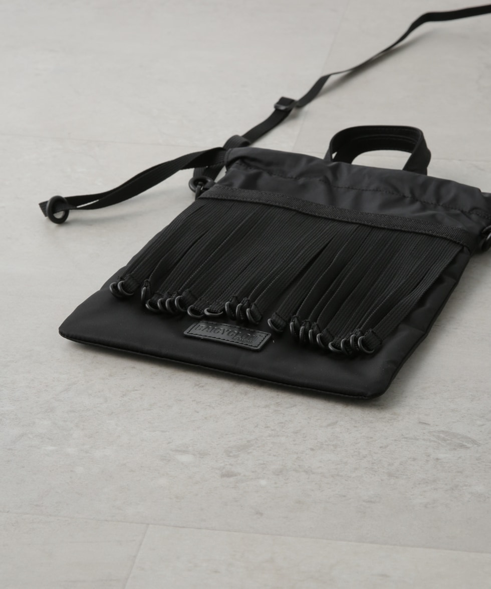 TAPE FRINGE DRAW STRING BAG / ブラック | 6704132020 | ナノ ...